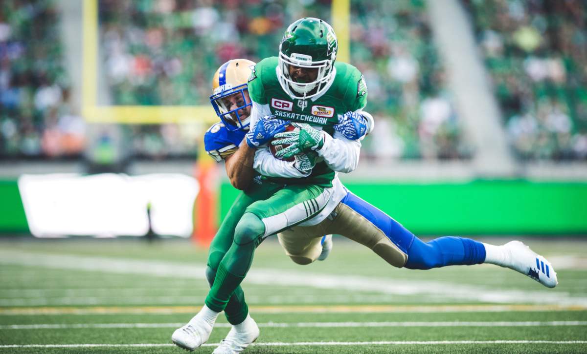 Bakari Grant (81) of the Saskatchewan Roughriders Taylor Loffler (16) of the Winnipeg Blue Bombers during the game at New Mosaic Stadium in Regina, SK, Saturday, July 1st, 2017. (Photo: Johany Jutras)