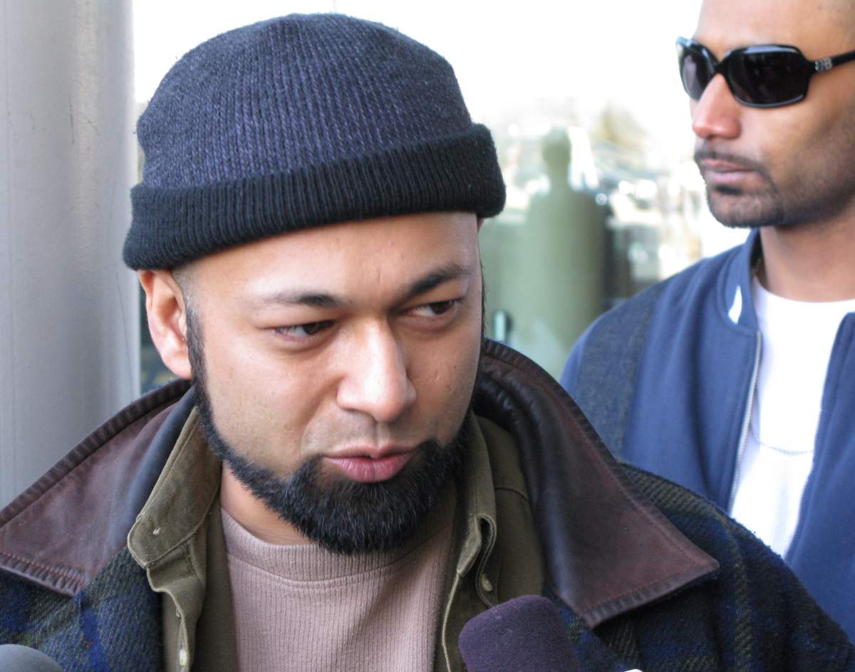 Paid RCMP informant Mubin Shaikh gives the thumbs up signal as he speaks outside a courtroom in Brampton, Ont., on Tuesday March 24, 2009, after a judge convicted a member of a home-grown terrorist cell. The judge ruled Shaikh had not entrapped the convicted youth or carried out criminal acts in infiltrating the “Toronto 18.” THE CANADIAN PRESS/Colin Perkel