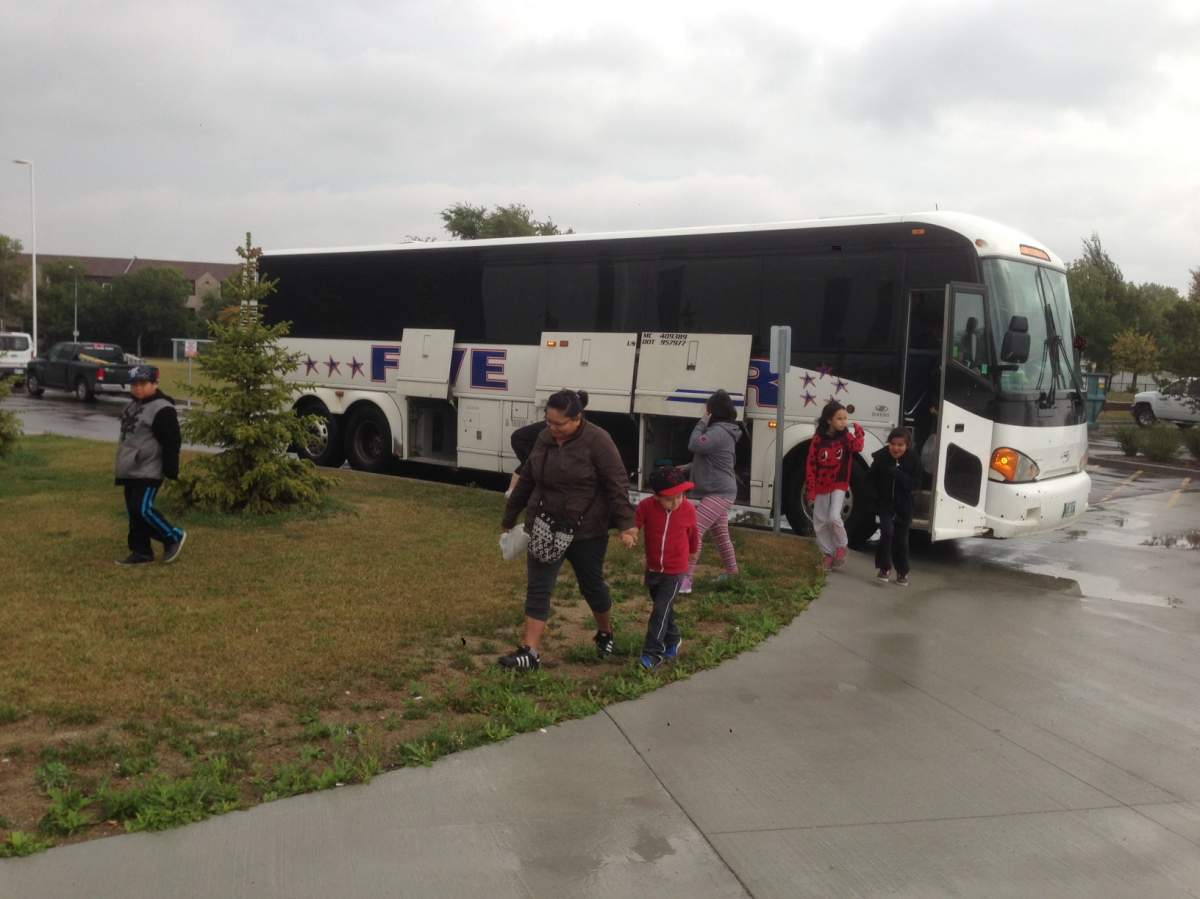 Some of the first evacuees arrive at Winnipeg’s second temporary shelter.