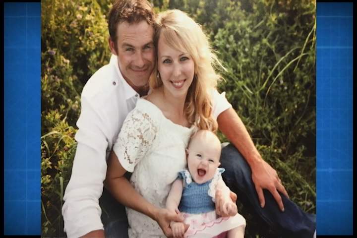 Shawn Barnett with his wife Samantha and their daughter Everleigh.