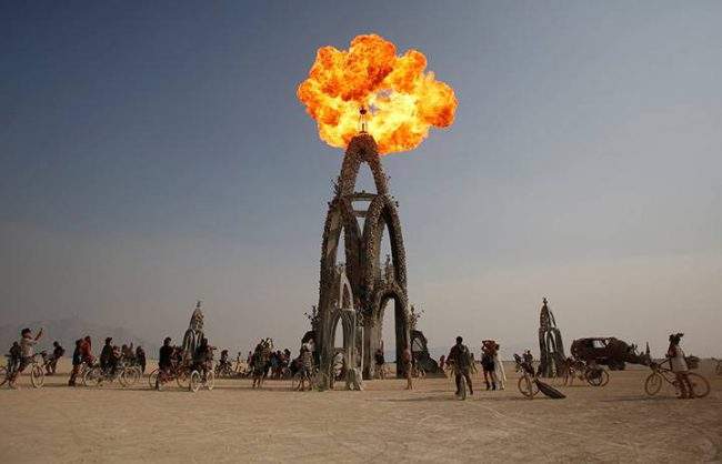 Flames shoot from the Flower Tower as approximately 70,000 people from all over the world gathered for the annual Burning Man arts and music festival in the Black Rock Desert of Nevada, August 31, 2017. 