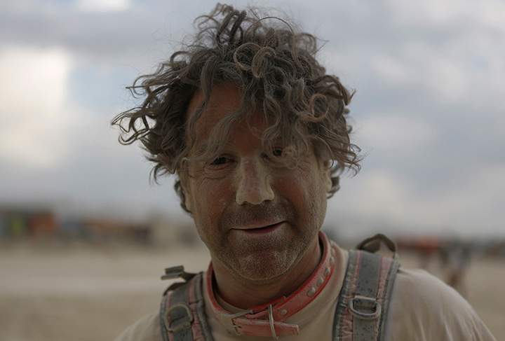 Participant David Huffman is covered by dust at the Burning Man arts and music festival in the Black Rock Desert of Nevada, August 29, 2017.