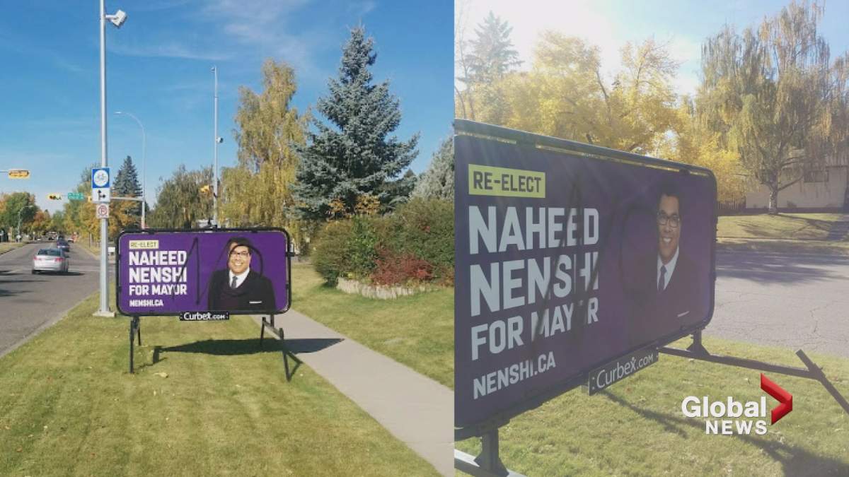 Campaign signs for Naheed Nenshi are seen vandalized in Calgary,