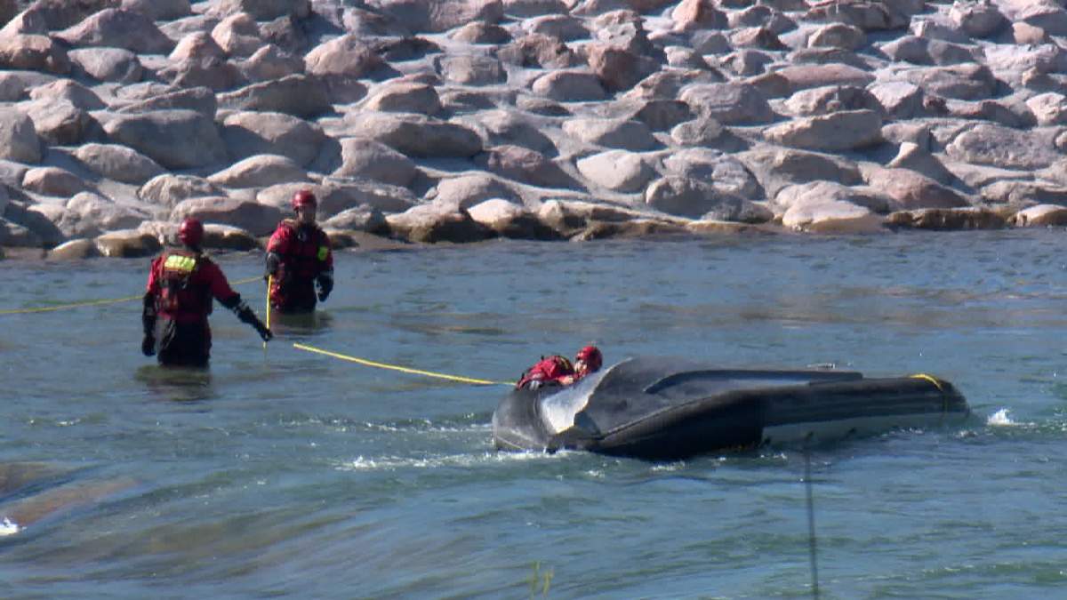 The Calgary Fire Department at the scene of an incident involving a CPS boat that flipped on the Bow River Sunday. 