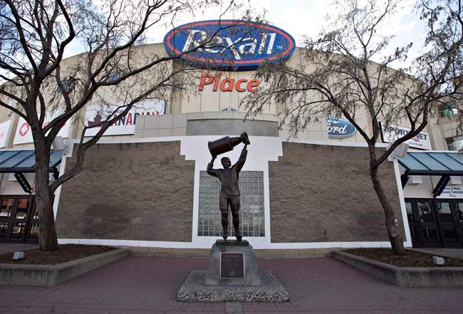 The Wayne Gretzky statue stands in front of Rexall Place home of the Edmonton Oilers in Edmonton, Alta., on Saturday April 2, 2016. 