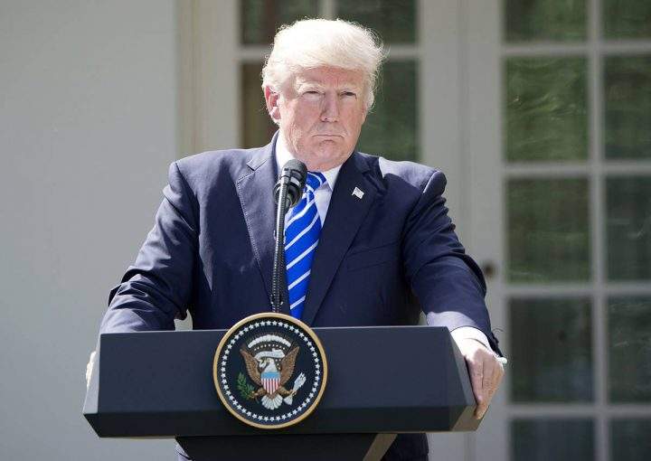 Donald Trump speaks at a press conference at the White House Rose Garden.