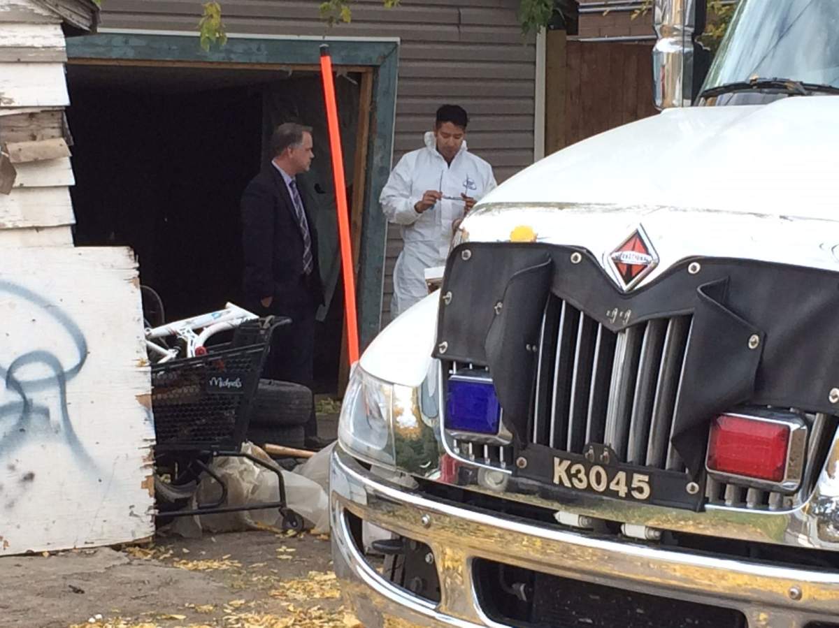 Edmonton Police Service homicide detectives are investigating after a man’s body was dug up from under a garage near 118 Avenue and 96 Street in north Edmonton. September 30, 2017.
