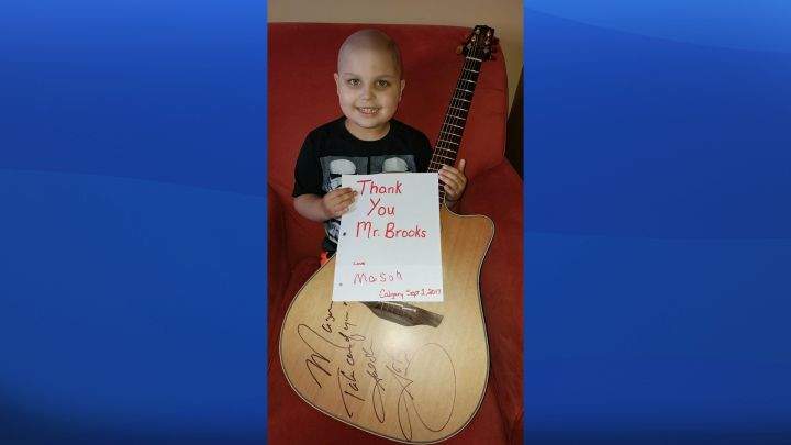 Garth Brooks thank you sign guitar