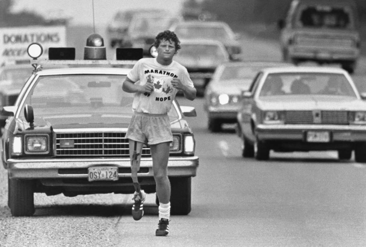 Terry Fox, 22, running coast-to-coast across Canada on an artificial limb in 1980. Fox lost his right leg to cancer three years earlier, and ran in an effort to raise money to fight the deadly disease.