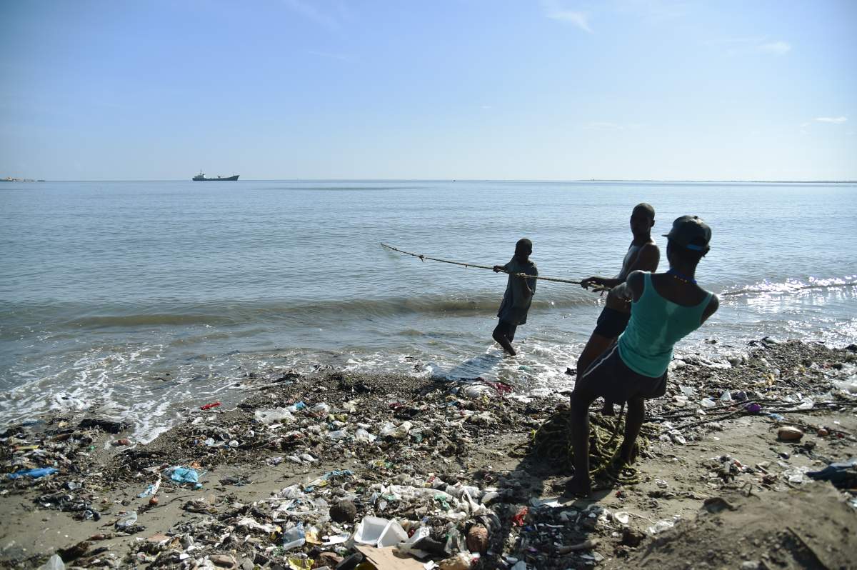 Fishermen pull a net while fishing in Cap-Haitien, Haiti, on September 6, 2017.Inhabitants of Shada, a poor riverside community in Cap-Haitien, were surprised to learn that a massive, potentially catastrophic hurricane was headed their way. They are in mortal danger from Irma, but nobody had bothered to warn them.