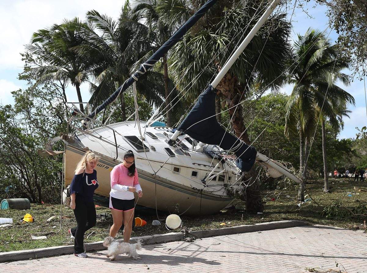 A boat is seen washed ashore at the Dinner Key marina after hurricane Irma passed through the area on September 11, 2017 in Miami, Florida.