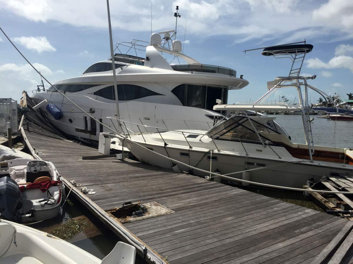 Boats are jammed into the pier after the passage of Hurricane Irma at Grove Harbour in Coconut Grove, Florida, on September 11, 2017.