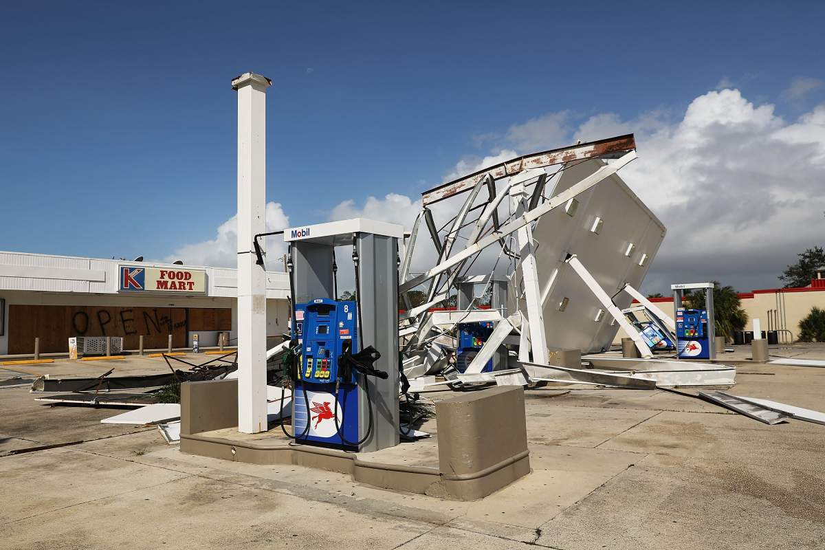 An awning is shown destroyed at a gas station the morning after Hurricane Irma swept through the area on September 11, 2017 in Naples, Florida.