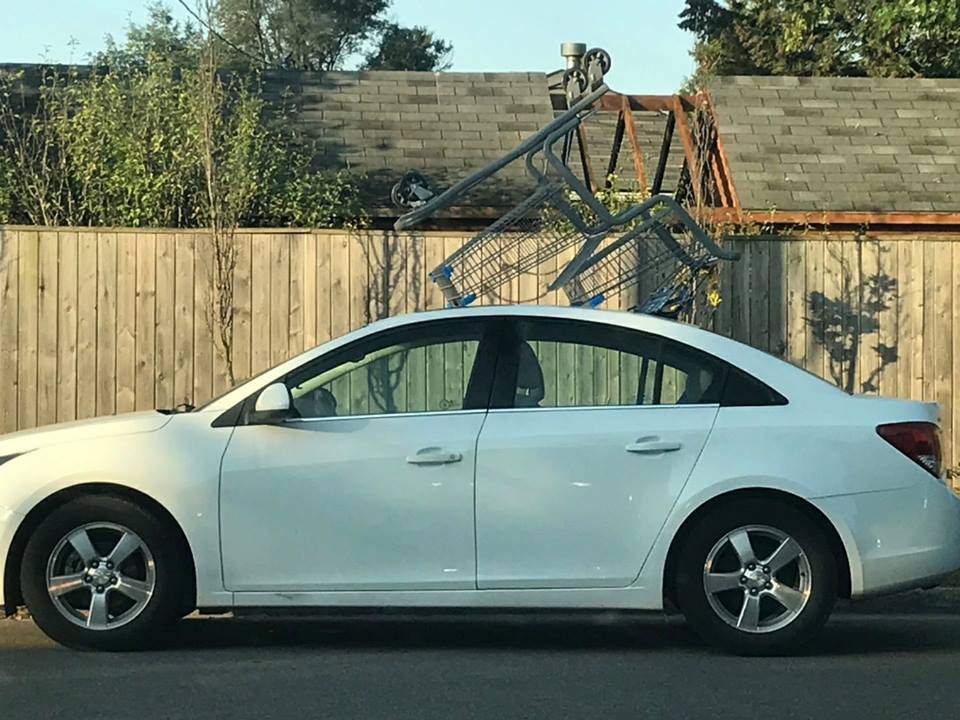 Photo posted to Facebook shows shopping cart mounted to the roof of a car during Homecoming Weekend in Guelph