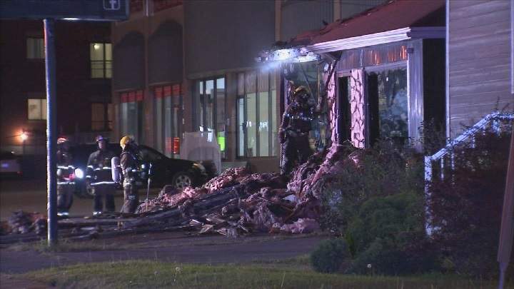 Police are investigating after a fire tore through a hair salon on des Laurentides Boulevard in Laval late Friday night, Sept. 29, 2017.
