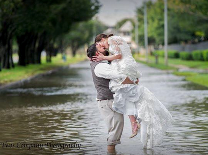 Chris and Shelley Holland weren't going to let a little water ruin their big day. 