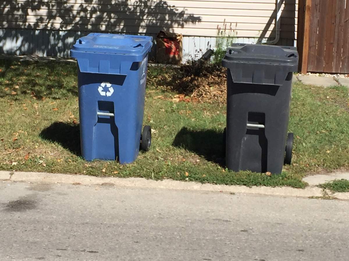City of Winnipeg recycling and garbage bins.