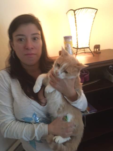 Chloe Calder with her cat Mr. Mouse