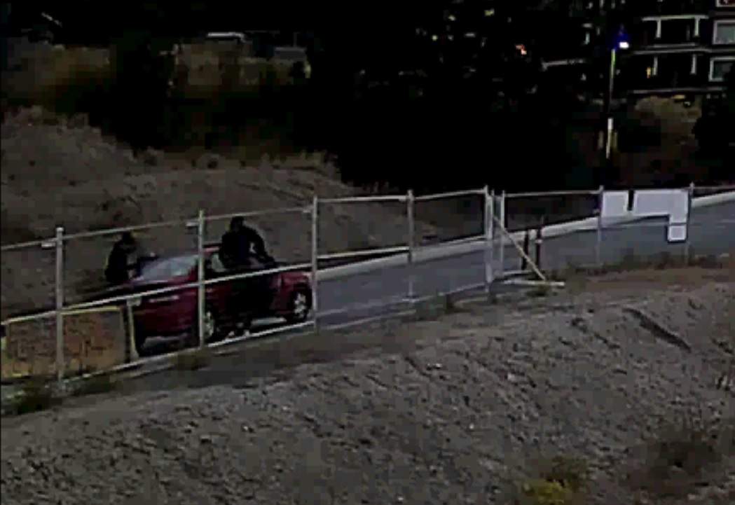 Police said this surveillance image from the Hudson's Bay Trail area shows two suspects getting out of the Honda Civic.  