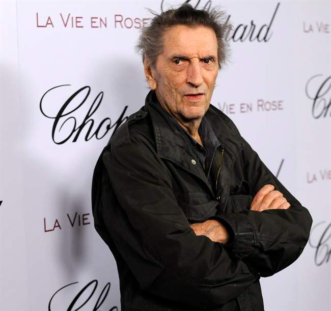In this Feb. 4, 2008, file photo, actor Harry Dean Stanton arrives at a celebration for actress Marion Cotillard in West Hollywood, Calif.