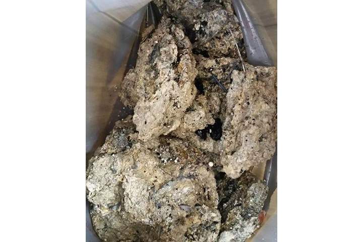 In this undated handout photo issued by Thames Water on Tuesday, Sept. 12, 2017, a view of part of a fatberg inside a sewer in Whitechapel, London.