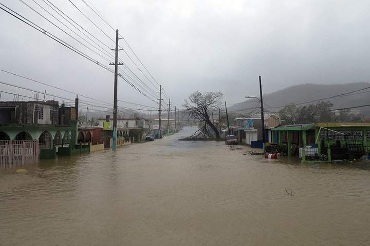 A partially flooded road is seen in Fajardo as Hurricane Maria hits Puerto Rico on September 20, 2017.