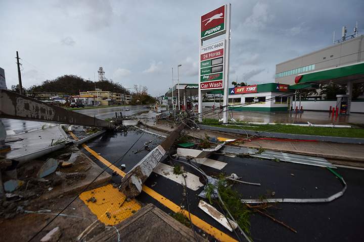 Light posts lay on the ground after the passage of Hurricane Maria, in San Juan, Puerto Rico, on September 20, 2017.