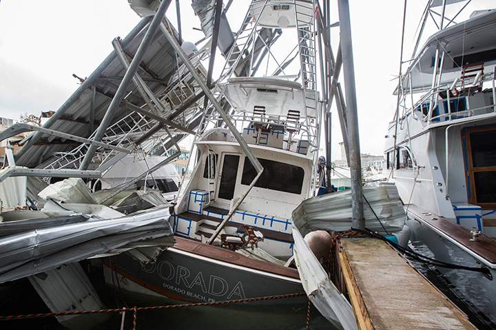 Damaged fishing boats pictured in San Juan Bay, Puerto Rico after the island was hit by Hurricane Maria, September 20, 2017.
