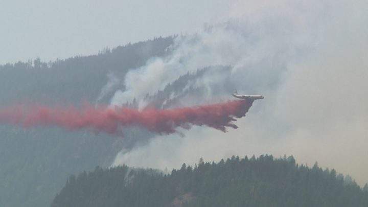 Crews are battling a blaze threatening the area around Moyie Lake. 