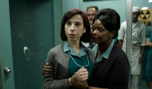 This file image released by Fox Searchlight Pictures shows Sally Hawkins, left, and Octavia Spencer in a scene from "The Shape of Water.".