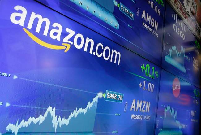 In this Tuesday, May 30, 2017, file photo, the Amazon logo is displayed at the Nasdaq MarketSite, in New York's Times Square. 