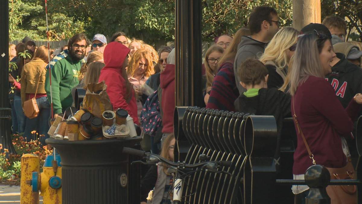 Fans line-up to check out a Harry Potter-themed pop-up shop in Edmonton.