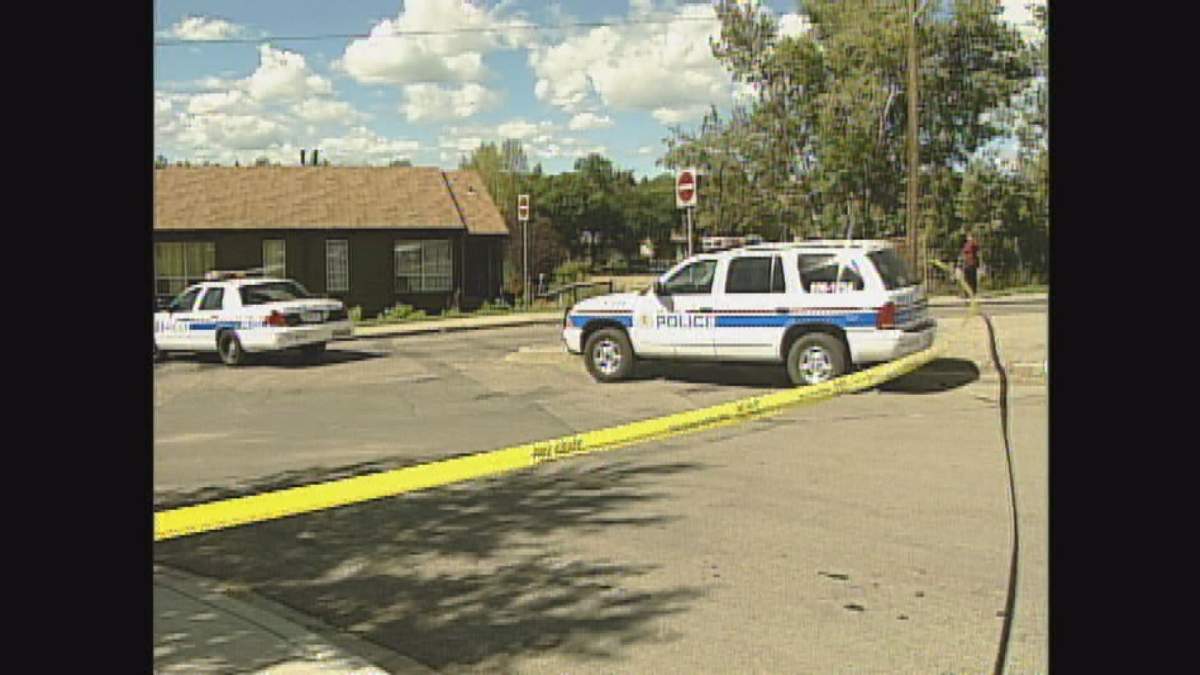 Police tape surrounds an Ogden home where Tanya Gordon was found dead in Aug. 2005.