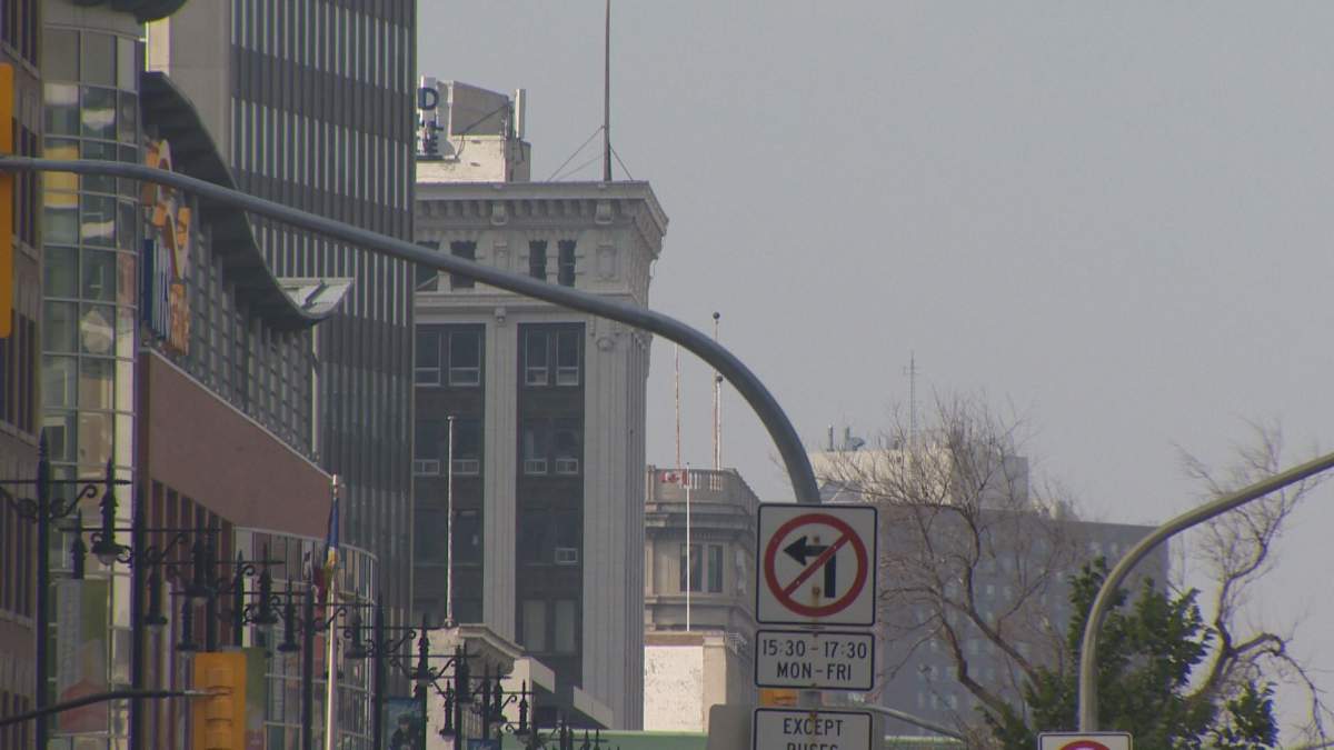 Smoke was visible over Winnipeg, early Monday morning. 