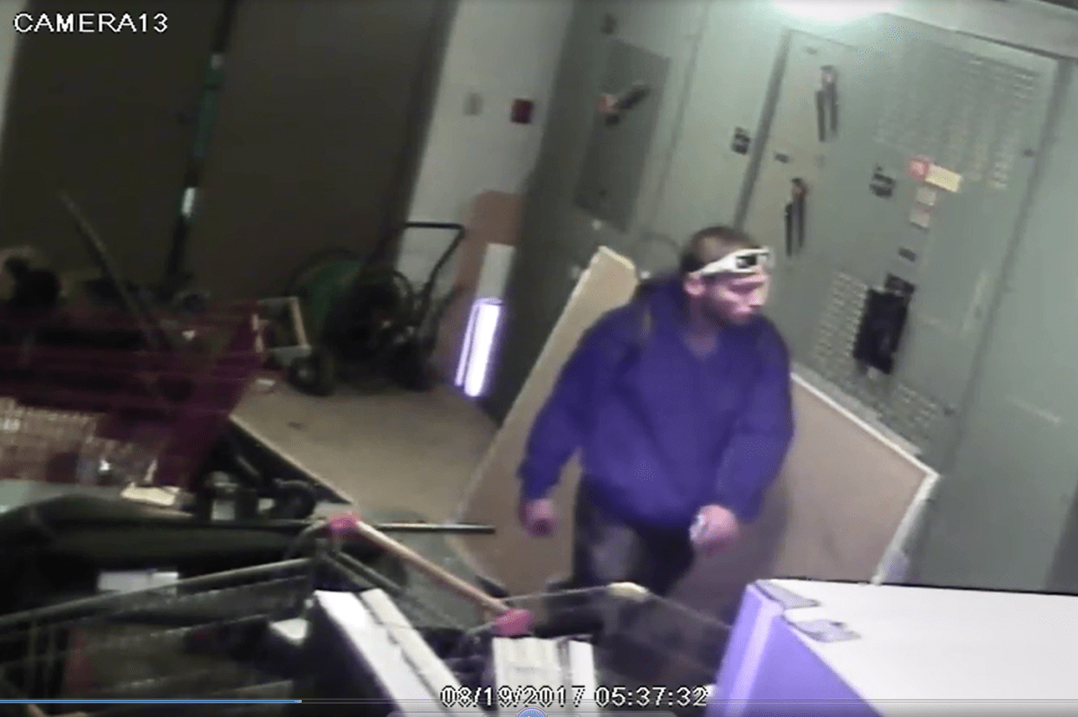 Surveillance images show a suspect wanted in connection with a break and enter and assault investigation.