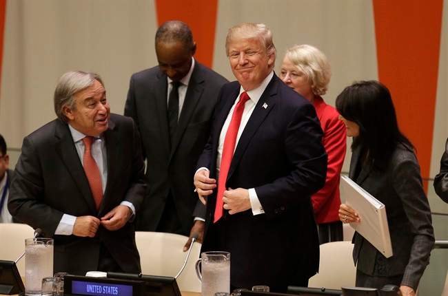 United States President Donald Trump, center, gets up to leave after making a quick statement at a meeting during the United Nations General Assembly at U.N. headquarters, Monday, Sept. 18, 2017.