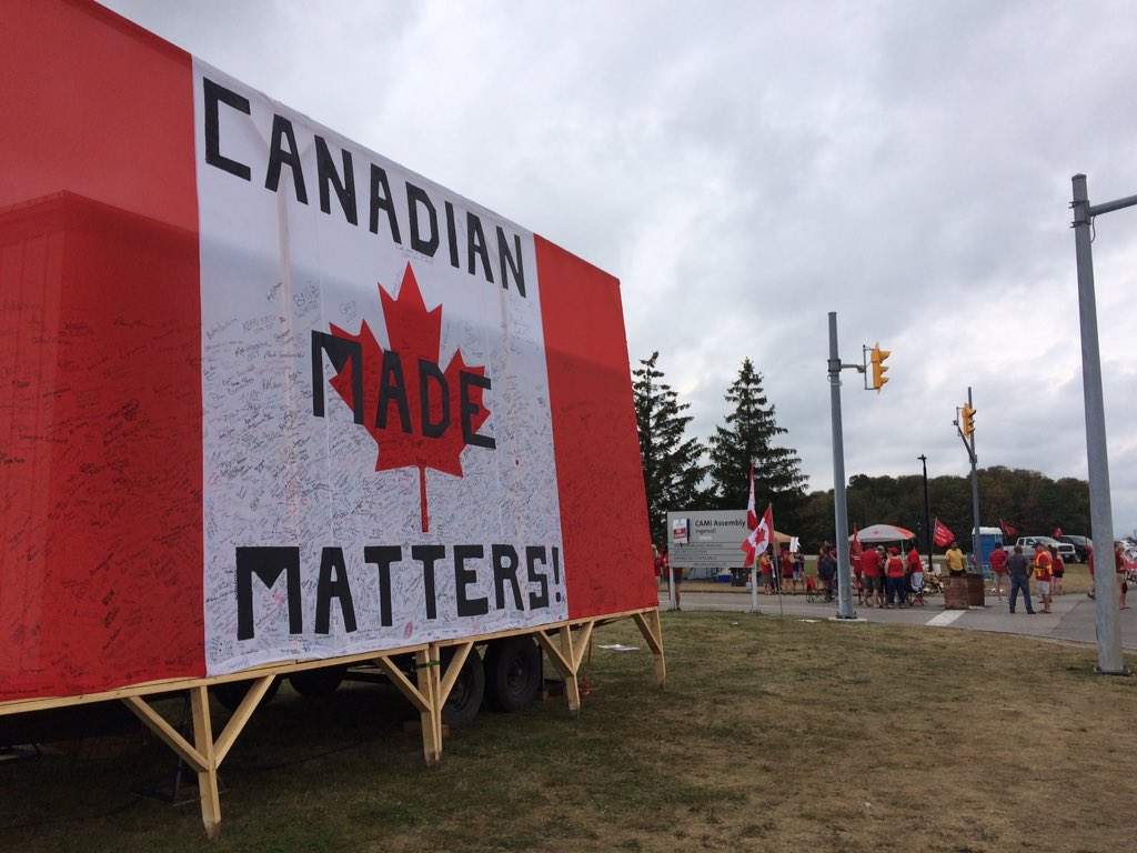 Adorned with signatures, this sign sits outside one of the CAMI entrances in Ingersoll where workers are picketing. 