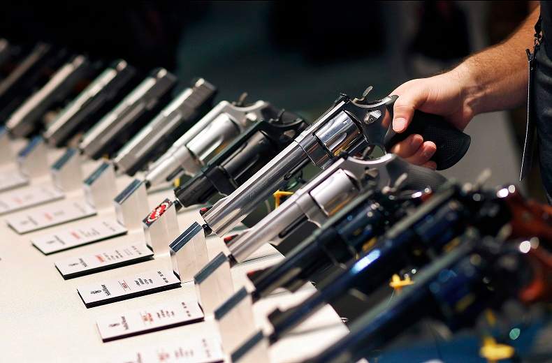 In this Jan. 19, 2016 file photo, handguns are on display.