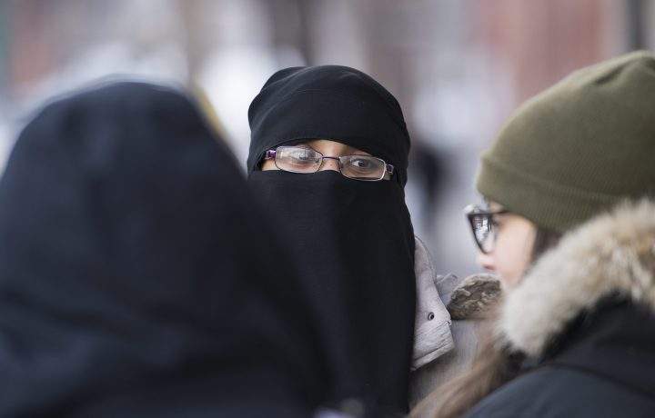 People rally outside the Khadijah Islamic centre in the Montreal borough of Pointe-Saint-Charles, Friday, Feb. 3, 2017,
