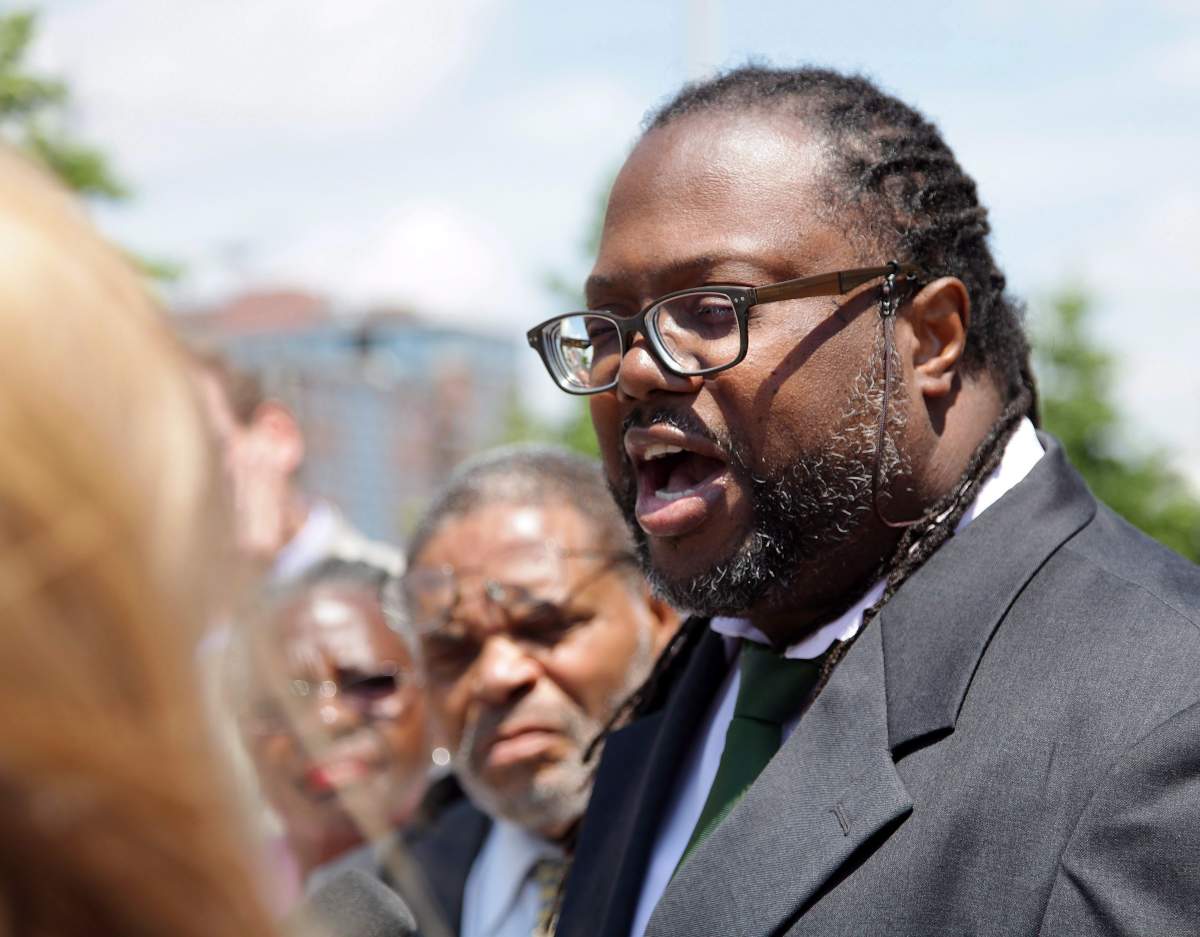 Lawyer Selwyn Pieters, with the Black Action Defence Committee, speaks outside coroner's court in Toronto on Friday, June 30, 2017.  