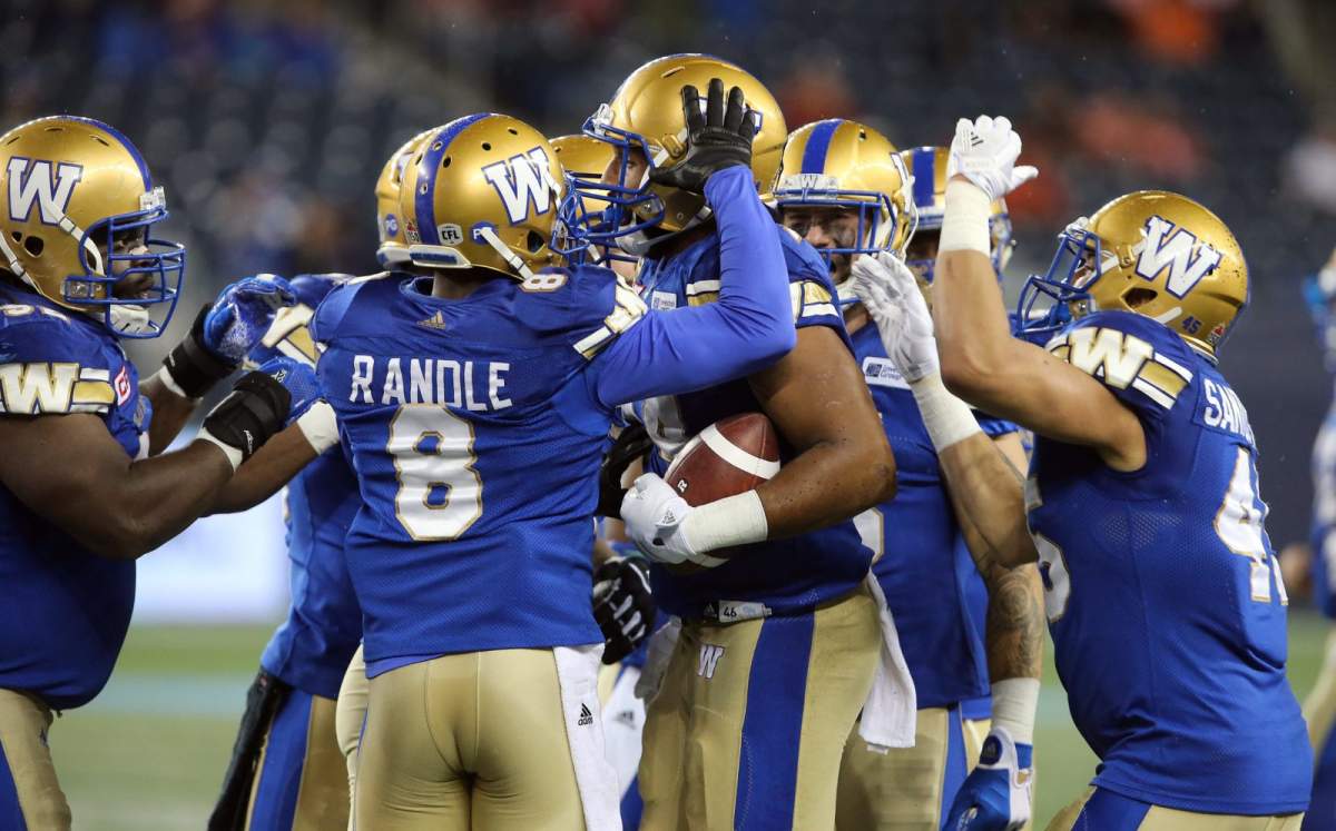 Winnipeg Blue Bombers DE Jackson Jeffcoat celebrates his fumble recovery during second quarter CFL action between the Bombers and the Ottawa Redblacks in Winnipeg on Friday, Sept. 22, 2017.