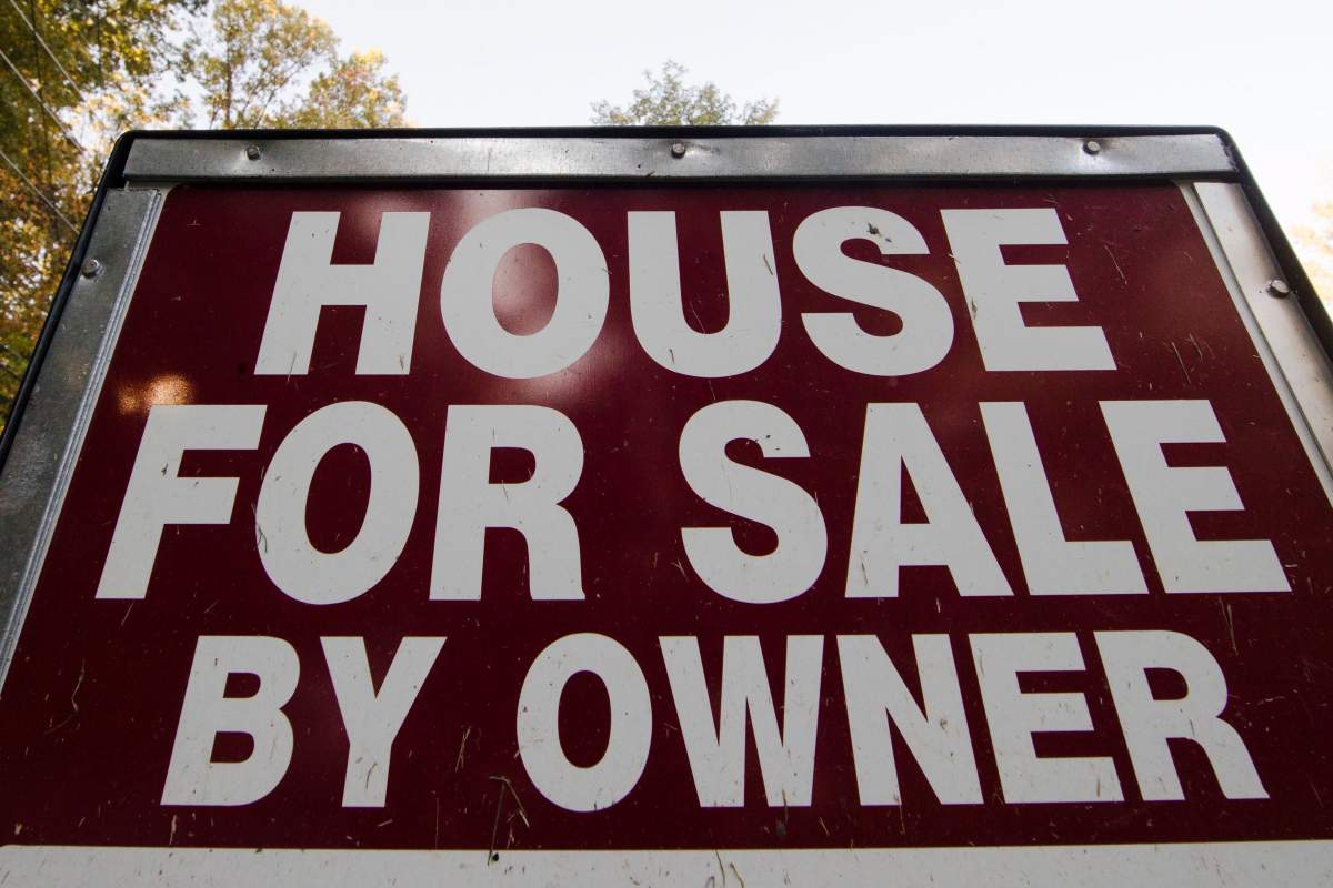 This Tuesday, Oct. 17, 2017, photo shows a "House for Sale by Owner" sign in a yard in Fort Washington, Pa. 
