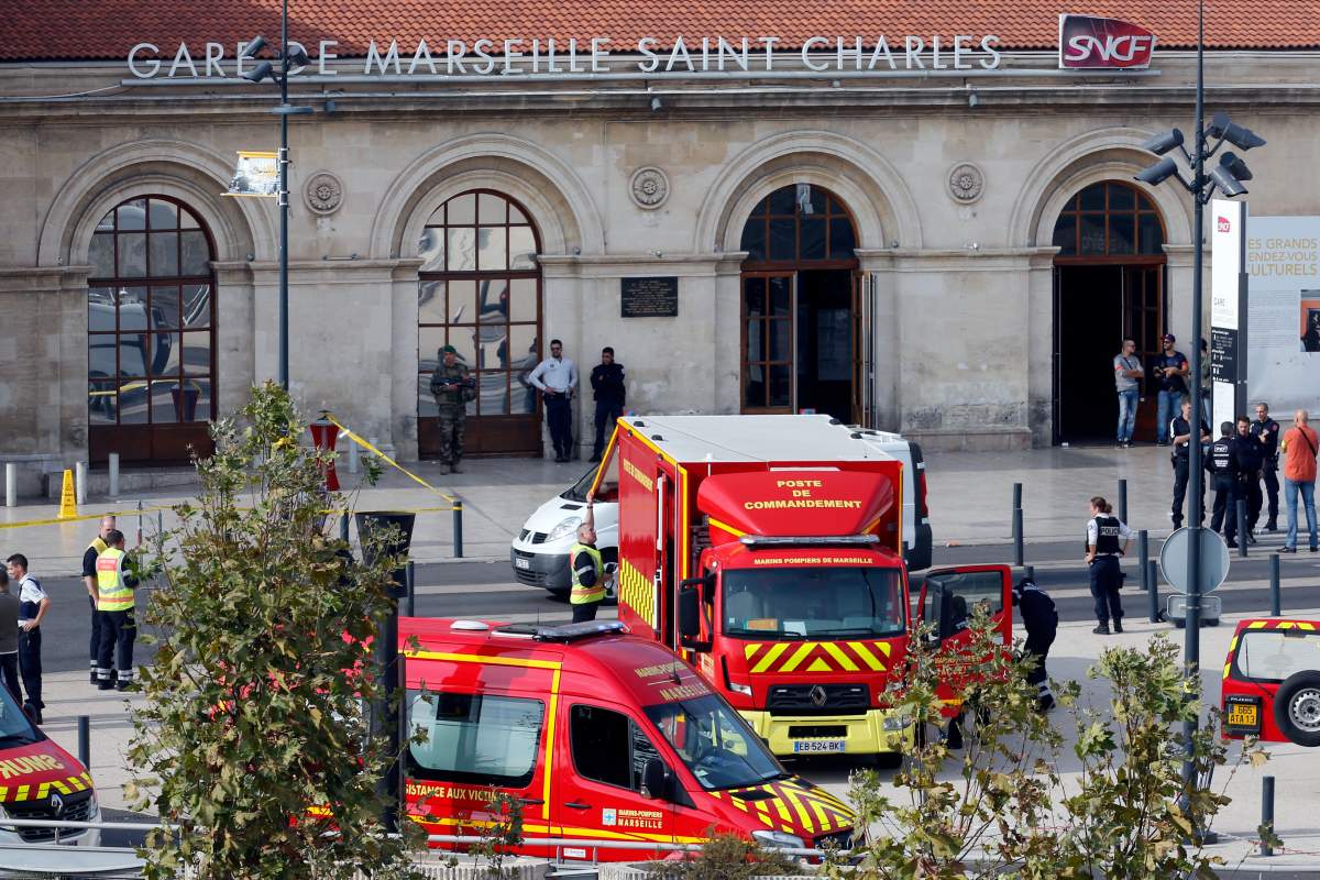 Emergency services vehicles are seen outside the Saint-Charles train station after French soldiers shot and killed a man who stabbed two women to death at the main train station in Marseille, France, October 1, 2017.