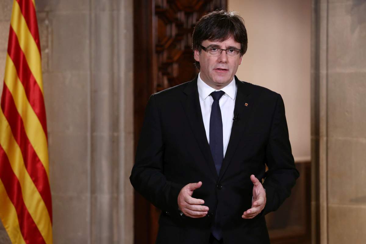 Catalan Regional President Carles Puigdemont gestures as he makes an statement at Generalitat Palace in Barcelona, Spain, October 4, 2017.