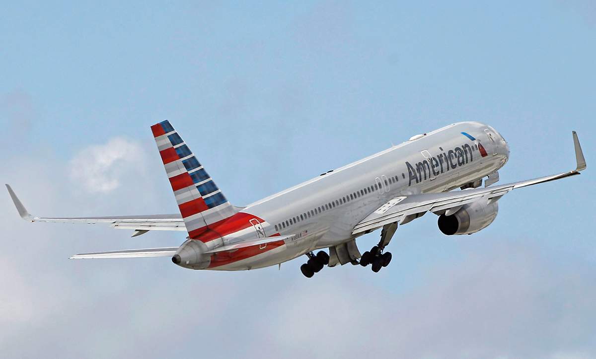 In this Friday, June 3, 2016, file photo, an American Airlines passenger jet takes off from Miami International Airport in Miami. 