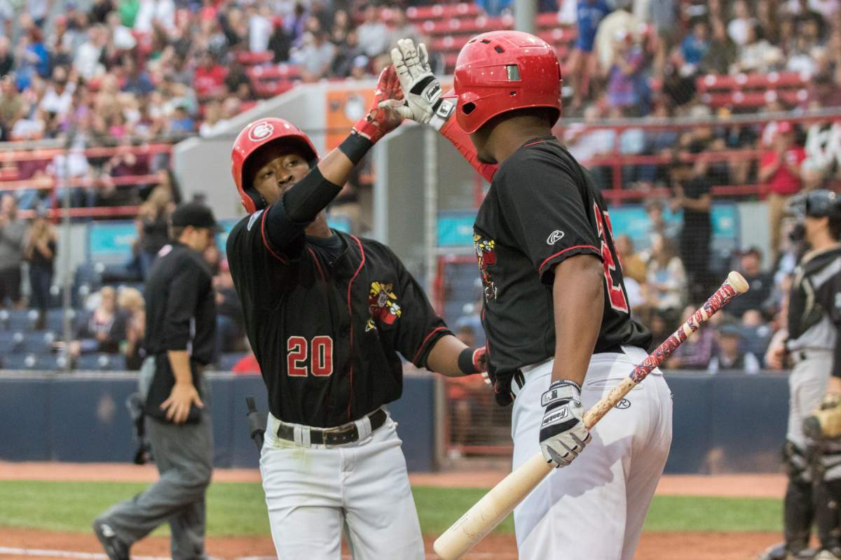 Samad Taylor high-fives a fellow team member.