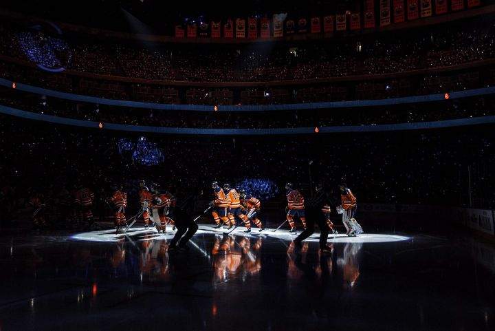 Edmonton Oilers players skate during opening ceremonies before taking on the Calgary Flames in Edmonton, Alta., on Wednesday October 4, 2017.