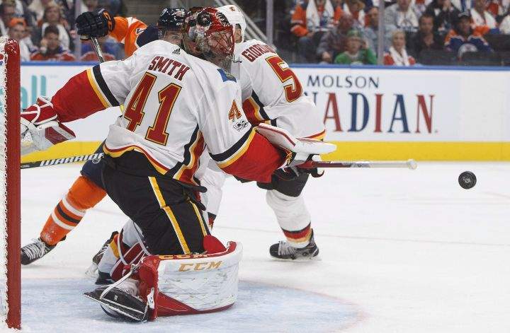 Calgary Flames goalie Mike Smith (41) makes the save against the Edmonton Oilers during second period NHL action in Edmonton, Alta., on Wednesday October 4, 2017.