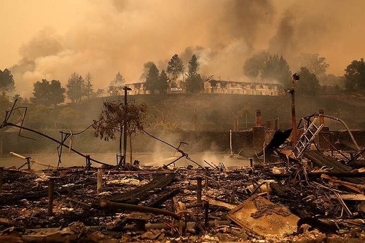 Smoke continues to rise from Hilton Sonoma Wine Country on October 9, 2017 in Santa Rosa, California.