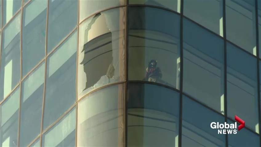A broken window is seen in Brookfield Place in downtown Calgary on Monday, Oct. 30. 
